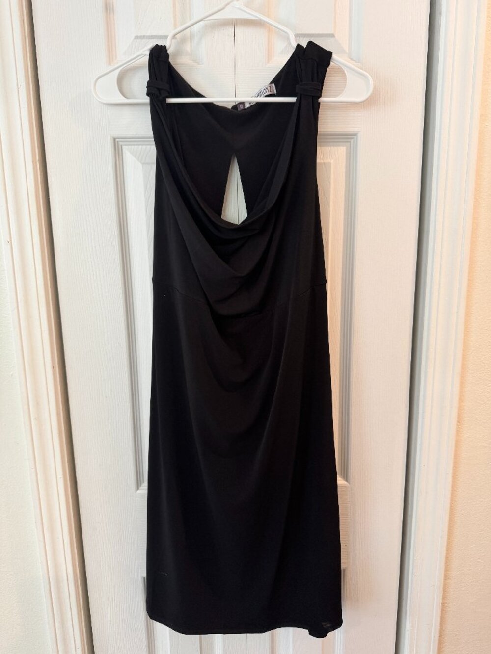 Jennifer Lopez black sleeveless dress w/ draped cowl neckline and an open back